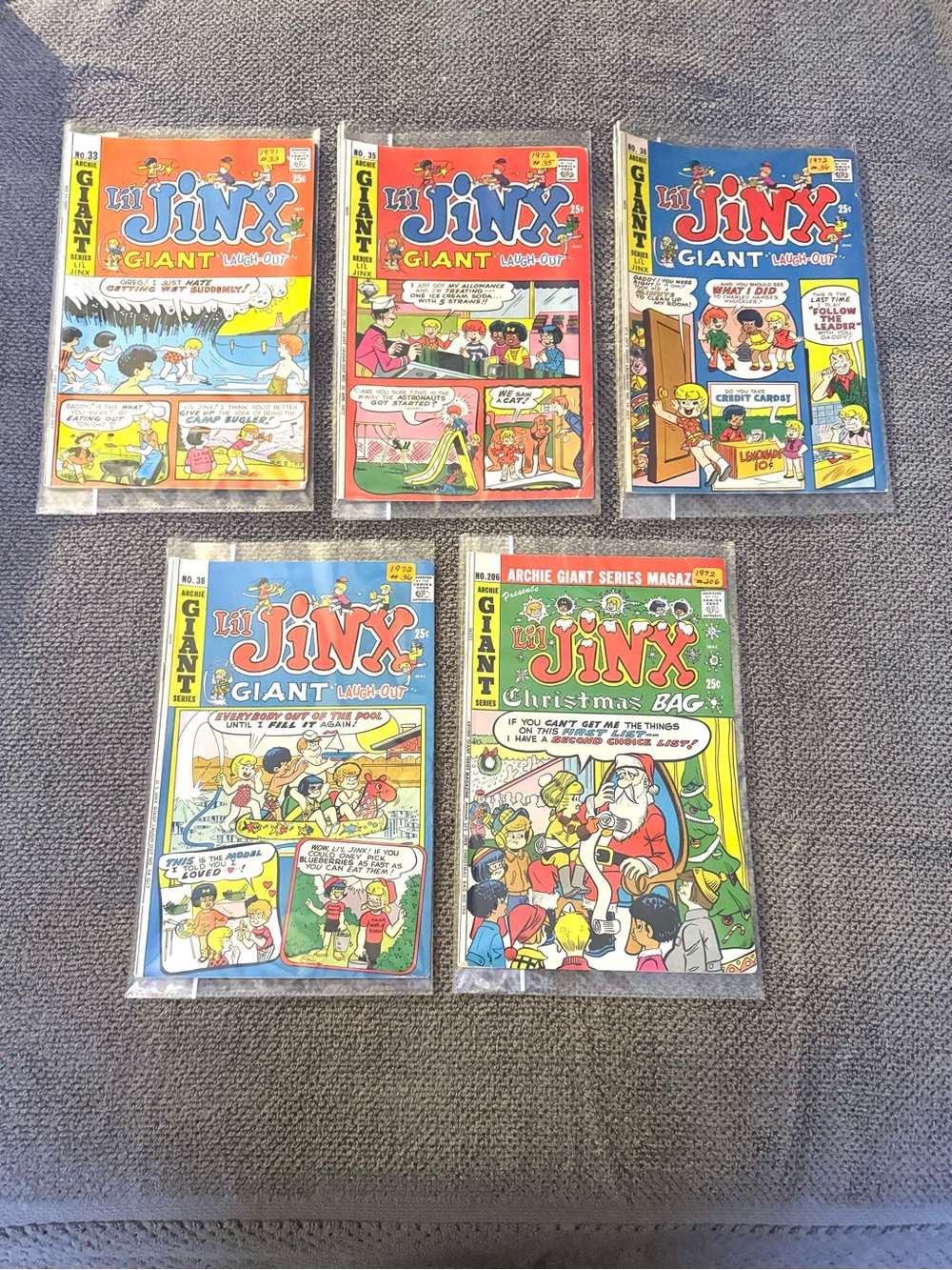 1971 - 1721 Lil Jinx Giant Laugh Out and One Lil Jinx Christmas Bag Comic Books.